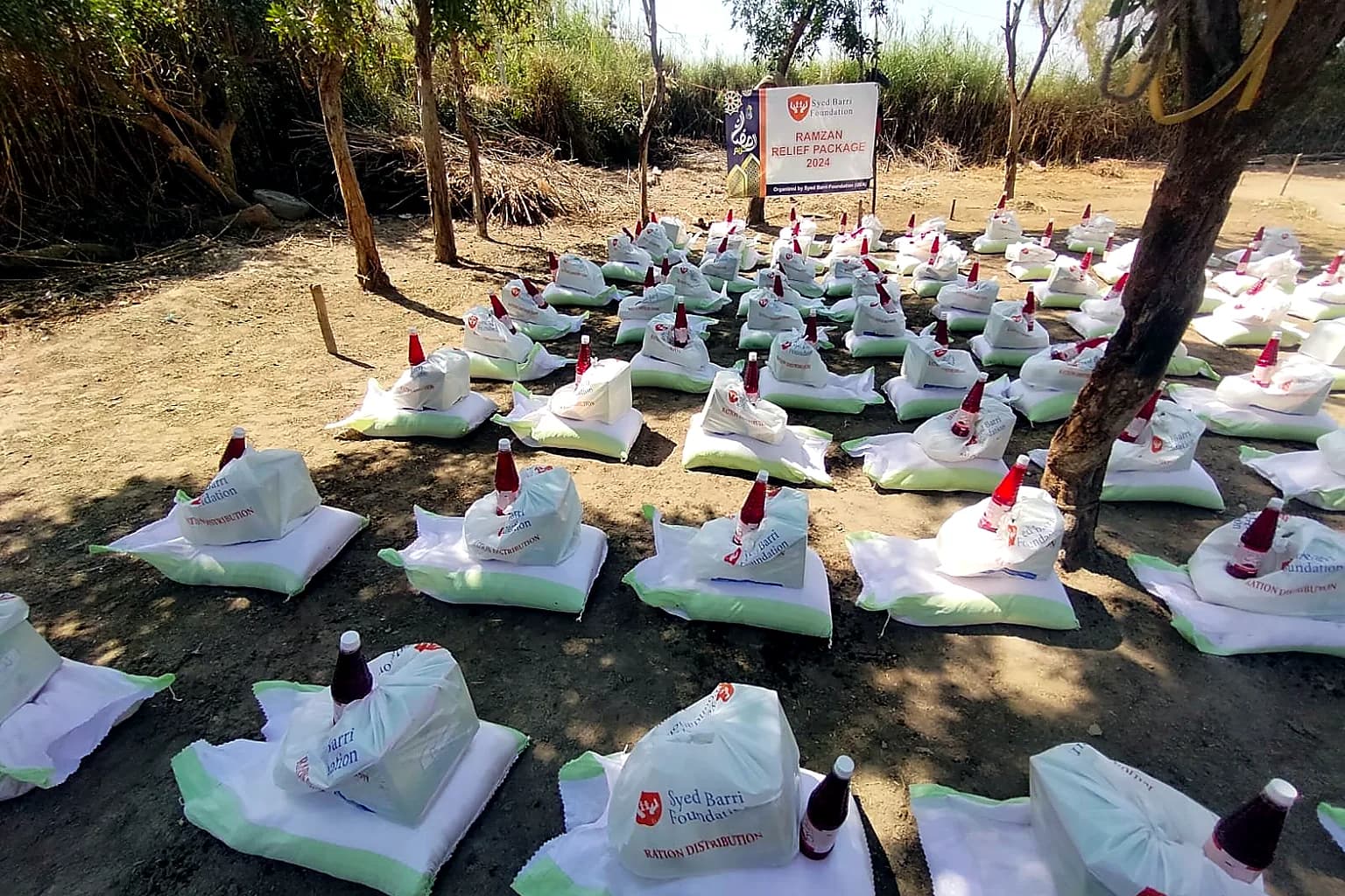 Relief bags staged outdoors before distribution