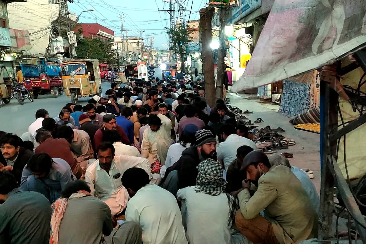 Large community gathering for meal service