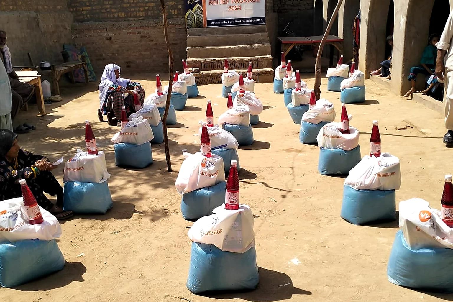 Outdoor relief supplies arranged for families