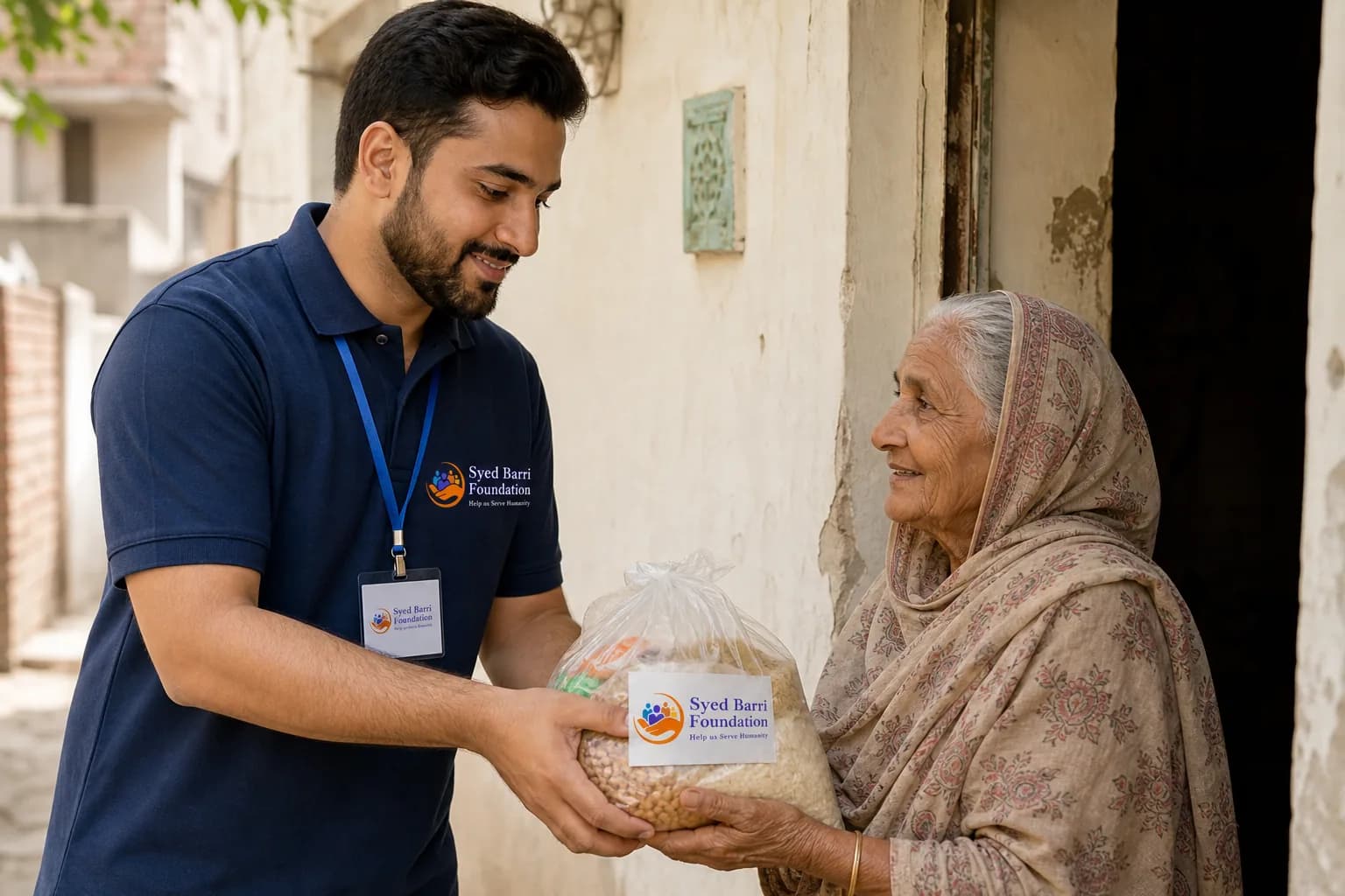 Foundation volunteer delivering a naturally branded meal parcel